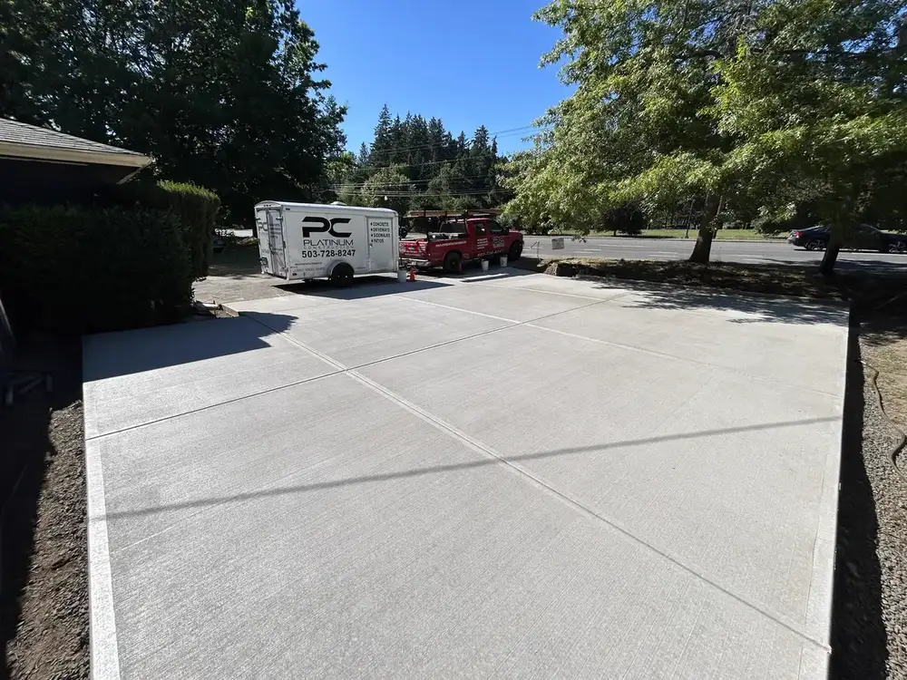 Platinum Construction LLC work trailer and truck on a completed residential concrete project